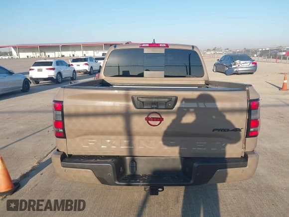 ✅ 2023 Nissan Frontier Pro-4X • VIN: 1N6ED1EK4PN674379 • Lot: 43437360. Listed on IAAI with 24,855 mi. Free auction sales archive from the USA and detailed vehicle history report at DreamBid. Image 16.