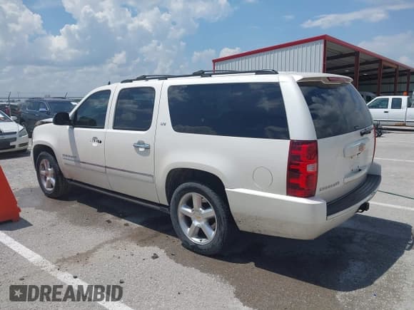 ✅ 2009 Chevrolet Suburban LTZ • VIN: 1GNFC36J79R292877 • Лот: 42577573. Опубликован ранее на IAAI с пробегом 209 101 миль. Бесплатный доступ к архиву аукционных продаж из США и подробный отчёт об истории автомобиля на DreamBid. Изображение 14.