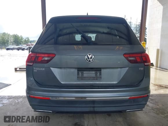 ✅ 2018 Volkswagen Tiguan SEL • VIN: 3VV3B7AX6JM054849 • Лот: 42303112. Опубликован ранее на IAAI с пробегом 87 574 миль. Бесплатный доступ к архиву аукционных продаж из США и подробный отчёт об истории автомобиля на DreamBid. Изображение 16.