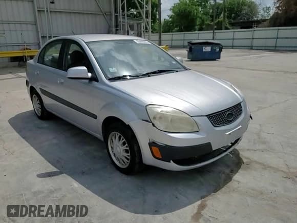 ✅ 2009 Kia Rio LX • VIN: KNADE223X96452390 • Лот: 55446055. Опубликован ранее на Copart с пробегом 170 118 миль. Бесплатный доступ к архиву аукционных продаж из США и подробный отчёт об истории автомобиля на DreamBid. Изображение 14.
