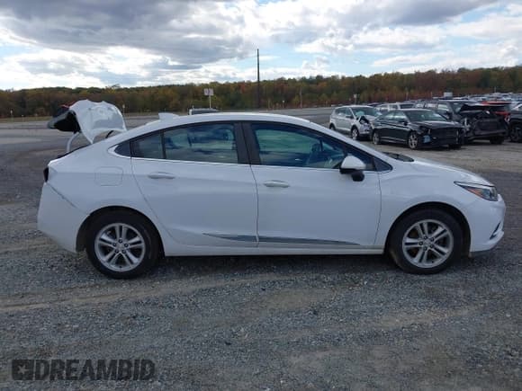 ✅ 2018 Chevrolet Cruze LT • VIN: 1G1BE5SM9J7167031 • Lot: 43396962. Listed on IAAI with 98,786 mi. Free auction sales archive from the USA and detailed vehicle history report at DreamBid. Image 13.