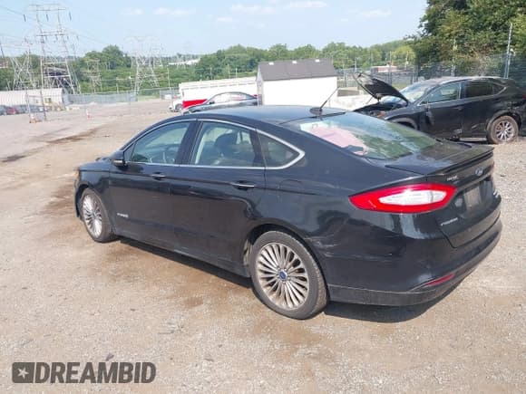 ✅ 2014 Ford Fusion Titanium Hybrid • VIN: 3FA6P0RUXER191158 • Lot: 42815287. Wystawiony na IAAI z przebiegiem 162 415 mil. Bezpłatny archiwum sprzedaży aukcyjnych z USA i szczegółowy raport historii pojazdu na DreamBid. Zdjęcie 3.