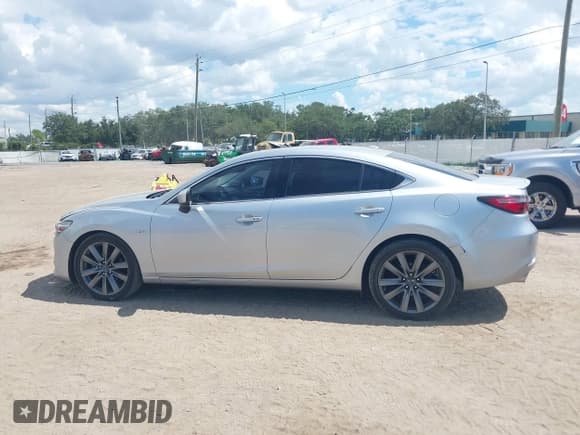 ✅ 2018 Mazda 6 Grand Touring • VIN: JM1GL1TY4J1318311 • Lot: 43240836. Listed on IAAI with 101,987 mi. Free auction sales archive from the USA and detailed vehicle history report at DreamBid. Image 15.