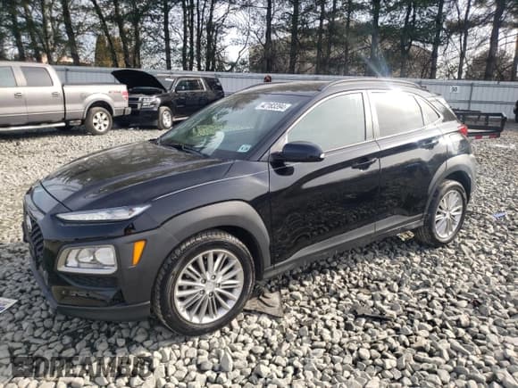 ✅ 2019 Hyundai Kona SEL • VIN: KM8K22AA1KU335622 • Лот: 42183394. Опубликован ранее на Copart с пробегом 49 115 миль. Бесплатный доступ к архиву аукционных продаж из США и подробный отчёт об истории автомобиля на DreamBid. Изображение 1.