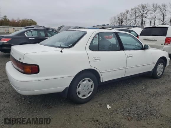 ✅ 1994 Toyota Camry LE • VIN: 4T1SK12EXRU366695 • Лот: 78595614. Опубликован ранее на Copart с пробегом 162 498 миль. Бесплатный доступ к архиву аукционных продаж из США и подробный отчёт об истории автомобиля на DreamBid. Изображение 3.