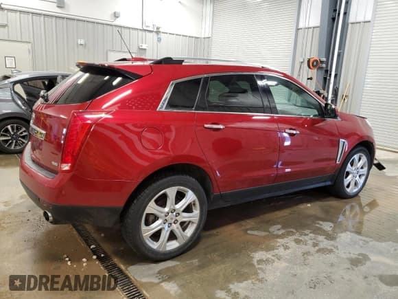 ✅ 2016 Cadillac SRX Premium Collection • VIN: 3GYFNDE36GS530718 • Лот: 63794485. Опубликован ранее на Copart с пробегом 132 493 миль. Бесплатный доступ к архиву аукционных продаж из США и подробный отчёт об истории автомобиля на DreamBid. Изображение 3.