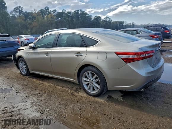✅ 2013 Toyota Avalon XLE Premium • VIN: 4T1BK1EB6DU035154 • Lot: 94241995. Listed on Copart with 299,768 mi. Free auction sales archive from the USA and detailed vehicle history report at DreamBid. Image 2.