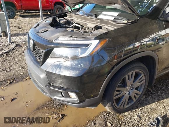 ✅ 2020 Honda Passport EX-L • VIN: 5FNYF8H52LB003956 • Lot: 43602808. Wystawiony na IAAI z przebiegiem 100 077 mil. Bezpłatny archiwum sprzedaży aukcyjnych z USA i szczegółowy raport historii pojazdu na DreamBid. Zdjęcie 6.