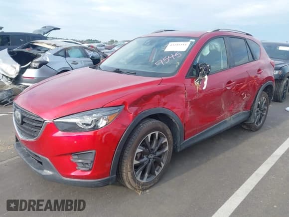 ✅ 2016 Mazda CX-5 Grand Touring • VIN: JM3KE4DY6G0737545 • Лот: 43241214. Опубликован ранее на IAAI с пробегом 178 994 миль. Бесплатный доступ к архиву аукционных продаж из США и подробный отчёт об истории автомобиля на DreamBid. Изображение 2.