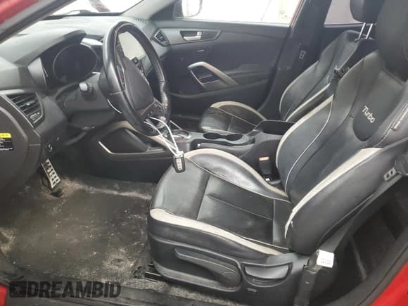 ✅ 2014 Hyundai Veloster Turbo • VIN: KMHTC6AE1EU208045 • Lot: 43454775. Wystawiony na Copart z przebiegiem 148 415 mil. Bezpłatny archiwum sprzedaży aukcyjnych z USA i szczegółowy raport historii pojazdu na DreamBid. Zdjęcie 7.