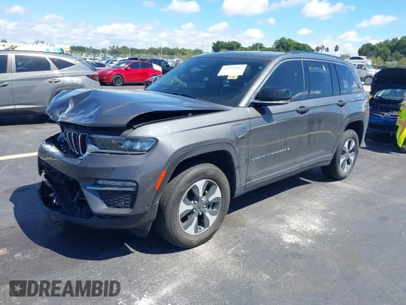 ✅ 2022 Jeep Grand Cherokee • VIN: 1C4RJYB65N8721475 • Lot: 43342814. Listed on IAAI with 81,606 mi. Free auction sales archive from the USA and detailed vehicle history report at DreamBid. Image 2.