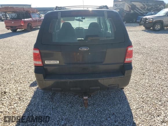 ✅ 2012 Ford Escape XLS • VIN: 1FMCU0C72CKB37116 • Lot: 81592555. Wystawiony na Copart z przebiegiem Nie podano. Bezpłatny archiwum sprzedaży aukcyjnych z USA i szczegółowy raport historii pojazdu na DreamBid. Zdjęcie 6.