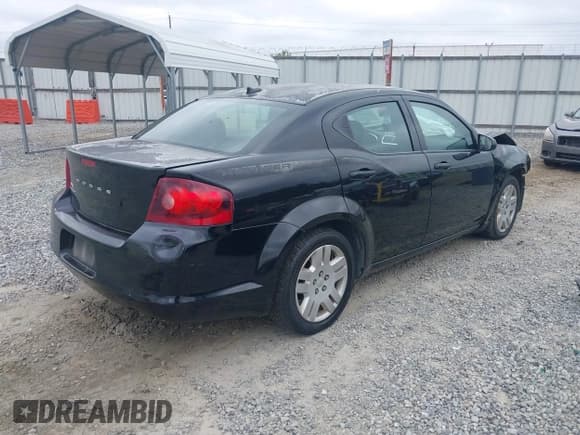 ✅ 2014 Dodge Avenger SE • VIN: 1C3CDZAB1EN120751 • Lot: 43313531. Listed on IAAI with 228,498 mi. Free auction sales archive from the USA and detailed vehicle history report at DreamBid. Image 4.