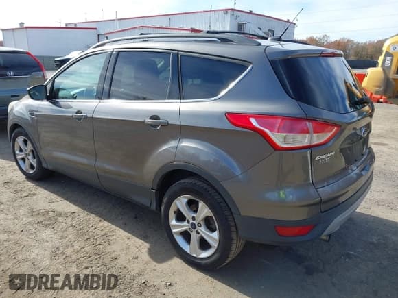 ✅ 2013 Ford Escape SE • VIN: 1FMCU9G99DUD33298 • Lot: 43607833. Listed on IAAI with 143,828 mi. Free auction sales archive from the USA and detailed vehicle history report at DreamBid. Image 3.
