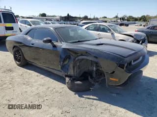 ✅ 2014 Dodge Challenger SXT • VIN: 2C3CDYAG3EH153152 • Lot: 74821454. Wystawiony na Copart z przebiegiem 99 890 mil. Bezpłatny archiwum sprzedaży aukcyjnych z USA i szczegółowy raport historii pojazdu na DreamBid. Zdjęcie 4.