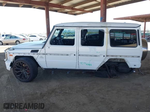 ✅ 2015 Mercedes-Benz G 63 AMG • VIN: WDCYC7DF5FX234579 • Lot: 42057392. Listed on IAAI with 124,585 mi. Free auction sales archive from the USA and detailed vehicle history report at DreamBid. Image 14.