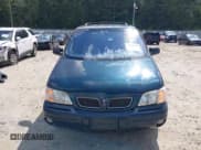 ✅ 1999 Pontiac Montana • VIN: 1GMDX03E6XD191135 • Lot: 43014424. Listed on IAAI with 227,071 mi. Free auction sales archive from the USA and detailed vehicle history report at DreamBid. Image 6.