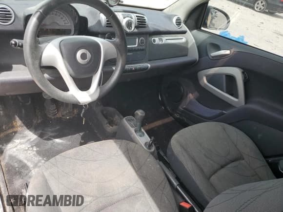 ✅ 2015 Smart fortwo Passion • VIN: WMEEJ9AAXFK831826 • Lot: 70655225. Listed on Copart with Not provided. Free auction sales archive from the USA and detailed vehicle history report at DreamBid. Image 8.