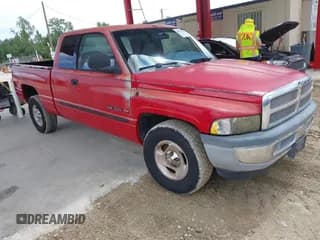 ✅ 2001 Dodge 1500 • VIN: 3B7HC13Z61G791092 • Lot: 42815850. Listed on IAAI with 123,803 mi. Free auction sales archive from the USA and detailed vehicle history report at DreamBid. Image 1.