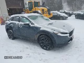 ✅ 2023 Mazda CX-30 S Preferred • VIN: 3MVDMBCM4PM574509 • Lot: 41522283. Listed on IAAI with 21,507 mi. Free auction sales archive from the USA and detailed vehicle history report at DreamBid. Image 1.