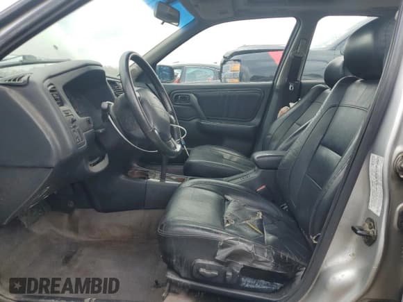 ✅ 2002 Infiniti G20 Luxury • VIN: JNKCP11A72T507144 • Лот: 54208075. Опубликован ранее на Copart с пробегом 189 441 миль. Бесплатный доступ к архиву аукционных продаж из США и подробный отчёт об истории автомобиля на DreamBid. Изображение 7.