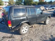 ✅ 2001 Jeep Cherokee Sport • VIN: 1J4FF58S61L530804 • Lot: 43519957. Listed on IAAI with 128,418 mi. Free auction sales archive from the USA and detailed vehicle history report at DreamBid. Image 4.