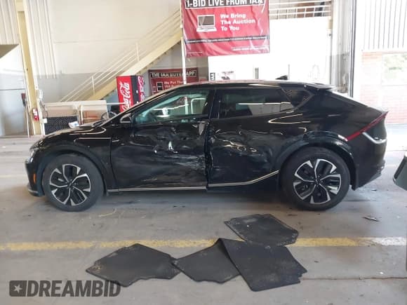 ✅ 2023 Kia EV6 Wind • VIN: KNDC3DLC4P5103534 • Lot: 42292161. Listed on IAAI with 11,180 mi. Free auction sales archive from the USA and detailed vehicle history report at DreamBid. Image 14.