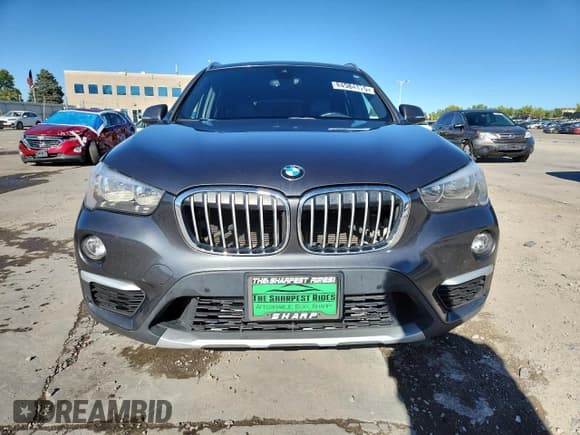 ✅ 2019 BMW X1 sDrive28i • VIN: WBXHU7C57K5L11781 • Lot: 84984175. Wystawiony na Copart z przebiegiem 96 925 mil. Bezpłatny archiwum sprzedaży aukcyjnych z USA i szczegółowy raport historii pojazdu na DreamBid. Zdjęcie 5.