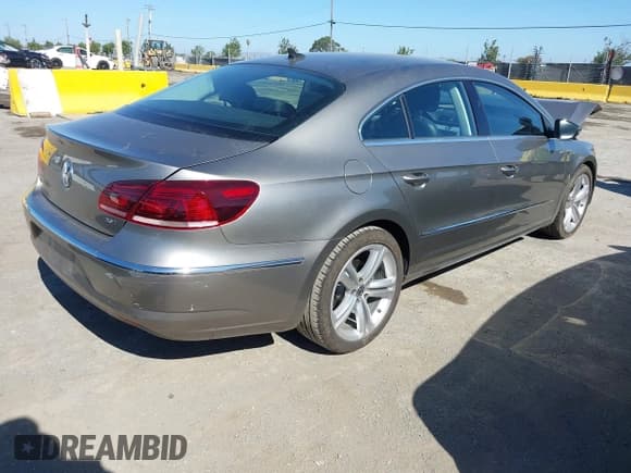 ✅ 2013 Volkswagen CC R-Line • VIN: WVWBP7AN5DE516953 • Lot: 42920630. Listed on IAAI with 107,428 mi. Free auction sales archive from the USA and detailed vehicle history report at DreamBid. Image 4.