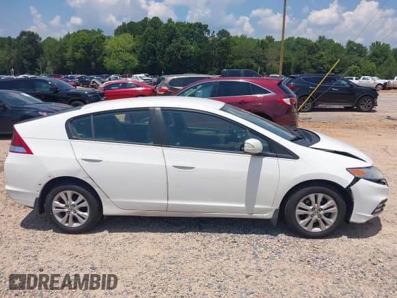 ✅ 2012 Honda Insight EX • VIN: JHMZE2H70CS001081 • Lot: 42675170. Wystawiony na IAAI z przebiegiem 231 777 mil. Bezpłatny archiwum sprzedaży aukcyjnych z USA i szczegółowy raport historii pojazdu na DreamBid. Zdjęcie 13.