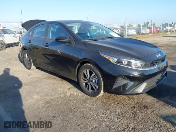 ✅ 2023 Kia Forte LXS • VIN: 3KPF24AD1PE567459 • Lot: 43176868. Listed on IAAI with 57,313 mi. Free auction sales archive from the USA and detailed vehicle history report at DreamBid. Image 1.