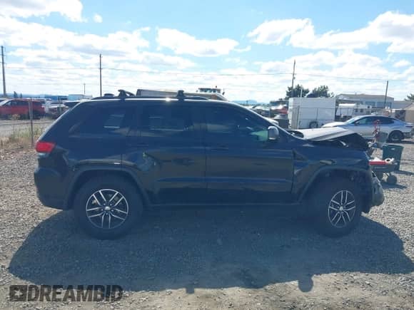 2017 Jeep Grand Cherokee Trailhawk with VIN 1C4RJFLT7HC754925, listed as a IAAI auction lot 43018651 with 118,604 mi miles and . Bid and sale history available at DreamBid. Image 13.