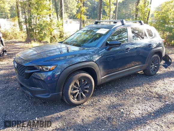 ✅ 2024 Mazda CX-50 S Premium • VIN: 7MMVABDM1RN240444 • Lot: 43410563. Listed on IAAI with 12,648 mi. Free auction sales archive from the USA and detailed vehicle history report at DreamBid. Image 18.