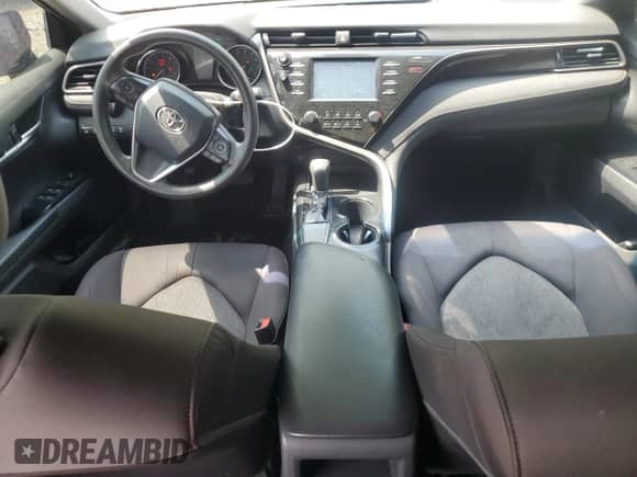 2019 Toyota Camry LE с VIN 4T1B11HK2KU159868, выставлен на аукционе Copart как лот 55486655 с пробегом 145 698 миль миль и Списание • Salvage title. История ставок и продаж доступна на DreamBid. Изображение 8.