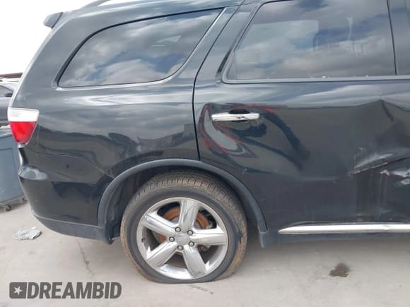 ✅ 2013 Dodge Durango Citadel • VIN: 1C4RDHEG5DC504757 • Lot: 41696972. Listed on IAAI with 133,049 mi. Free auction sales archive from the USA and detailed vehicle history report at DreamBid. Image 19.