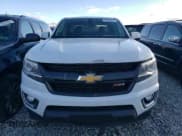 ✅ 2015 Chevrolet Colorado 4WD Z71 • VIN: 1GCGTCE38F1203277 • Лот: 75563414. Опубликован ранее на Copart с пробегом 137 008 миль. Бесплатный доступ к архиву аукционных продаж из США и подробный отчёт об истории автомобиля на DreamBid. Изображение 5.