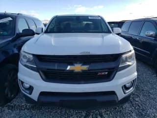 ✅ 2015 Chevrolet Colorado 4WD Z71 • VIN: 1GCGTCE38F1203277 • Лот: 75563414. Опубликован ранее на Copart с пробегом 137 008 миль. Бесплатный доступ к архиву аукционных продаж из США и подробный отчёт об истории автомобиля на DreamBid. Изображение 5.