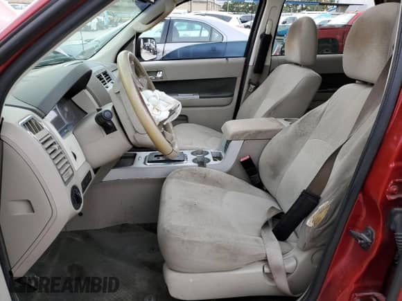 2011 Mercury Mariner z VIN 4M2CN8B77BKJ04820, wystawiony jako Copart lot #77322383 z przebiegiem Nie podano mil oraz Szkoda całkowita • Salvage title. Historia ofert i sprzedaży dostępna na DreamBid. Obrazek 7.