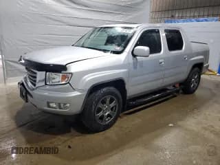 ✅ 2014 Honda Ridgeline RTL • VIN: 5FPYK1F56EB001577 • Lot: 60514275. Listed on Copart with 128,509 mi. Free auction sales archive from the USA and detailed vehicle history report at DreamBid. Image 1.