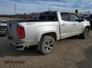 ✅ 2019 Chevrolet Colorado 4WD Z71 • VIN: 1GCGTDEN2K1267185 • Лот: 76899464. Опубликован ранее на Copart с пробегом 129 017 миль. Бесплатный доступ к архиву аукционных продаж из США и подробный отчёт об истории автомобиля на DreamBid. Изображение 3.