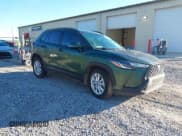 ✅ 2023 Toyota Corolla Cross LE • VIN: 7MUBAAAG2PV048135 • Лот: 43488213. Опубликован ранее на IAAI с пробегом 48 192 миль. Бесплатный доступ к архиву аукционных продаж из США и подробный отчёт об истории автомобиля на DreamBid. Изображение 1.