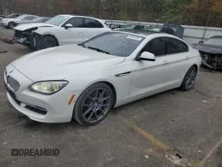✅ 2014 BMW 6 Series 650i • VIN: WBA6B2C56ED129008 • Лот: 93859705. Опубликован ранее на Copart с пробегом 127 171 миль. Бесплатный доступ к архиву аукционных продаж из США и подробный отчёт об истории автомобиля на DreamBid. Изображение 1.