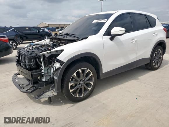 ✅ 2016 Mazda CX-5 Grand Touring • VIN: JM3KE2DY3G0697560 • Lot: 71099075. Wystawiony na Copart z przebiegiem 42 102 mil. Bezpłatny archiwum sprzedaży aukcyjnych z USA i szczegółowy raport historii pojazdu na DreamBid. Zdjęcie 1.