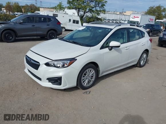 ✅ 2017 Subaru Impreza Premium • VIN: 4S3GTAB60H3749243 • Lot: 43481085. Listed on IAAI with 71,482 mi. Free auction sales archive from the USA and detailed vehicle history report at DreamBid. Image 17.