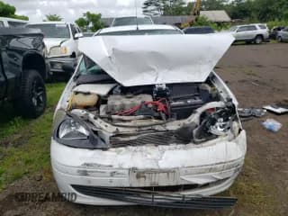 ✅ 2004 Ford Focus LX • VIN: 1FAFP33P74W164340 • Lot: 70513195. Wystawiony na Copart z przebiegiem 186 485 mil. Bezpłatny archiwum sprzedaży aukcyjnych z USA i szczegółowy raport historii pojazdu na DreamBid. Zdjęcie 5.