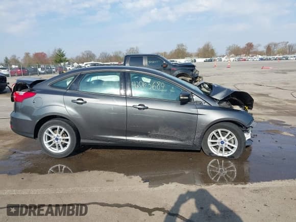 ✅ 2016 Ford Focus SE • VIN: 1FADP3F22GL350882 • Lot: 42063689. Listed on IAAI with 37,764 mi. Free auction sales archive from the USA and detailed vehicle history report at DreamBid. Image 14.