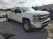 2015 Chevrolet Silverado 2500HD Work Truck z VIN 1GC1KUEG4FF128047, wystawiony jako Copart lot #52867355 z przebiegiem 91 860 mil mil oraz Szkoda całkowita • Salvage title. Historia ofert i sprzedaży dostępna na DreamBid. Obrazek 1.
