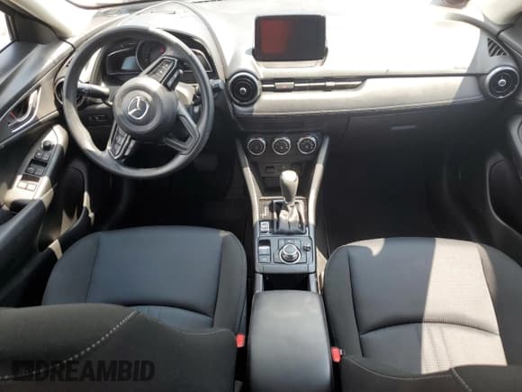 ✅ 2021 Mazda CX-3 Sport • VIN: JM1DKDB74M1501390 • Лот: 65446315. Опубликован ранее на Copart с пробегом 27 764 миль. Бесплатный доступ к архиву аукционных продаж из США и подробный отчёт об истории автомобиля на DreamBid. Изображение 8.