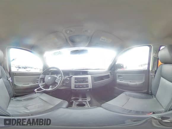 2010 Dodge Dakota Laramie z VIN 1D7RW5GP9AS217497, wystawiony jako Copart lot #84239104 z przebiegiem Nie podano mil oraz Czysty tytuł • Clean title. Historia ofert i sprzedaży dostępna na DreamBid. Obrazek 13.