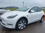 ✅ 2023 Tesla Model Y Long Range • VIN: 7SAYGDEE5PF712612 • Lot: 40392709. Listed on IAAI with 31,009 mi. Free auction sales archive from the USA and detailed vehicle history report at DreamBid. Image 2.